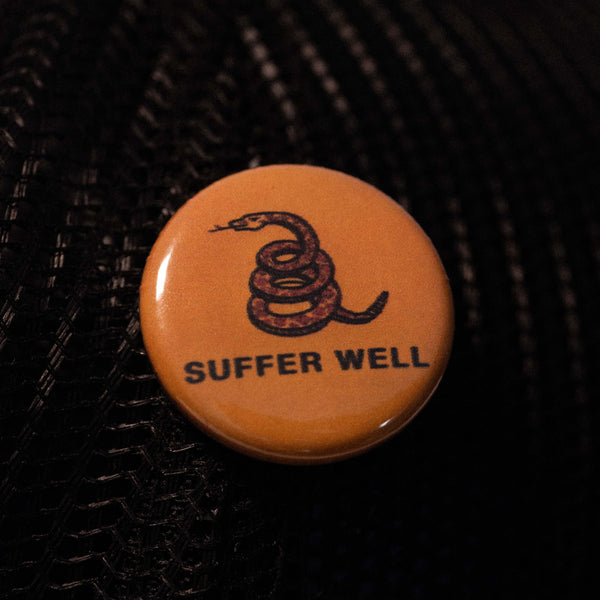 SUFFER SNAKE PIN BUTTON